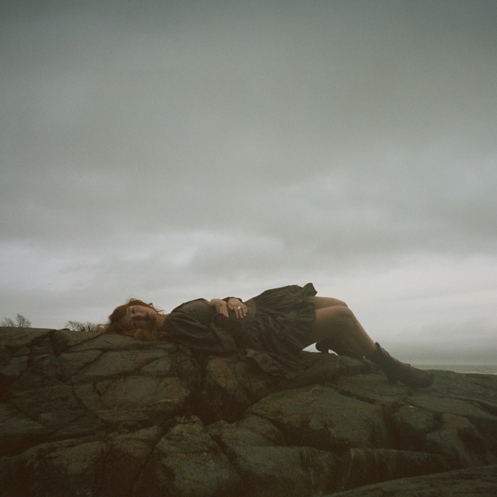 the album cover for Bella White - A Sign In The Weather