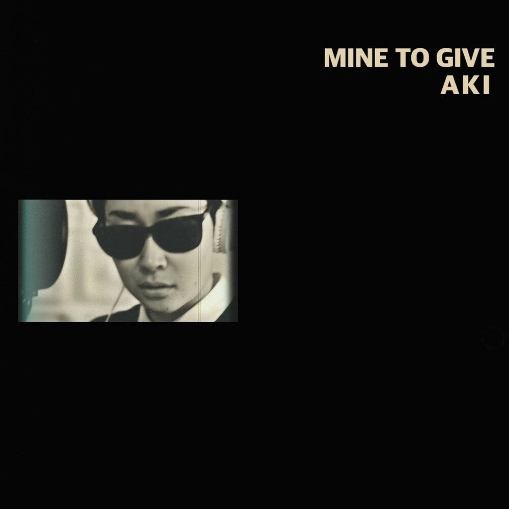 the album cover for Aki - Mind To Give