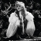 the album cover for Suki Waterhouse - Loveland [Red LP/Poster]