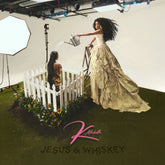 the album cover for K. Michelle - Jesus & Whiskey