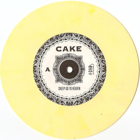 Cake : Sheep Go To Heaven / Jesus Wrote A Blank Check (7", RSD, Single, Ltd, Yel)