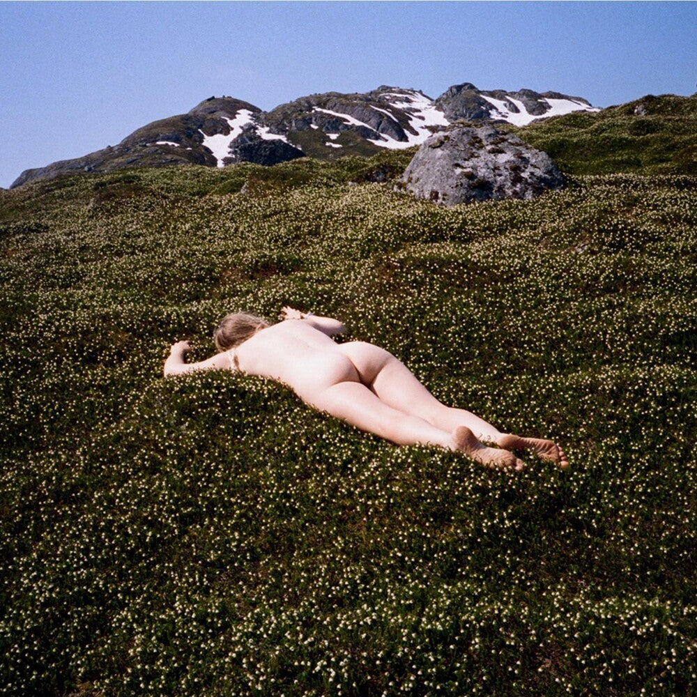 the album cover for Bnny - One Million Love Songs - Tri Color Splatter [Colored Vinyl]