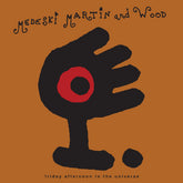the album cover for Medeski Martin & Wood - Friday Afternoon In The Universe [Magenta]