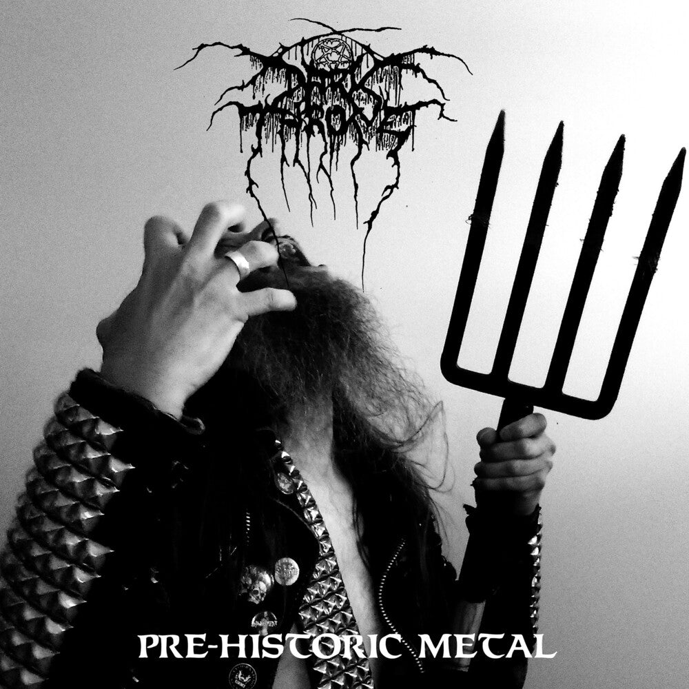 the album cover for Darkthrone - Pre-Historic Metal [Indie Exclusive Coke Bottle Green]