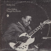 the album cover for Buddy Guy - I Was Walking Through The Woods [180 Gram]