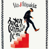 the album cover for Fito y Fitipaldis - Huyendo Conmigo De Mi (Spa)