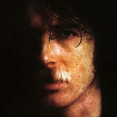 the album cover for Charly Garcia - Yendo De La Cama Al Living