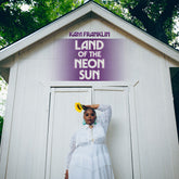 the album cover for Kam Franklin - Land of the Neon Sun