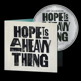 the album cover for Joy Oladokun - Hope Is A Heavy Thing