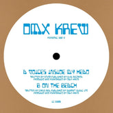 the album cover for Dmx Krew - Voices Inside My Head On The Beach