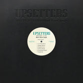 the album cover for Upsetters - Upsetters 14 Dub Black Board Jungle