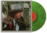 the album cover for Bob Dylan - Desire - [D2C / Indie Exclusive Cypress Green Marbled]
