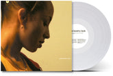 the album cover for Sade - Lovers Rock - [D2C / Indie Exclusive Clear]