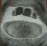 the album cover for Skullflower - Obsidian Shaking Codex (Bonus Tracks) [Clear Vinyl] [Deluxe]